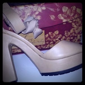 Peep toe ankle strap heel